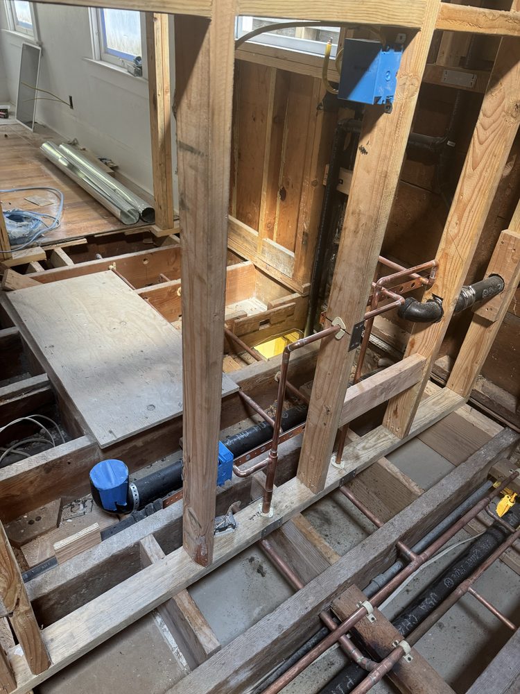 Full bathroom rough-in plumbing during renovation